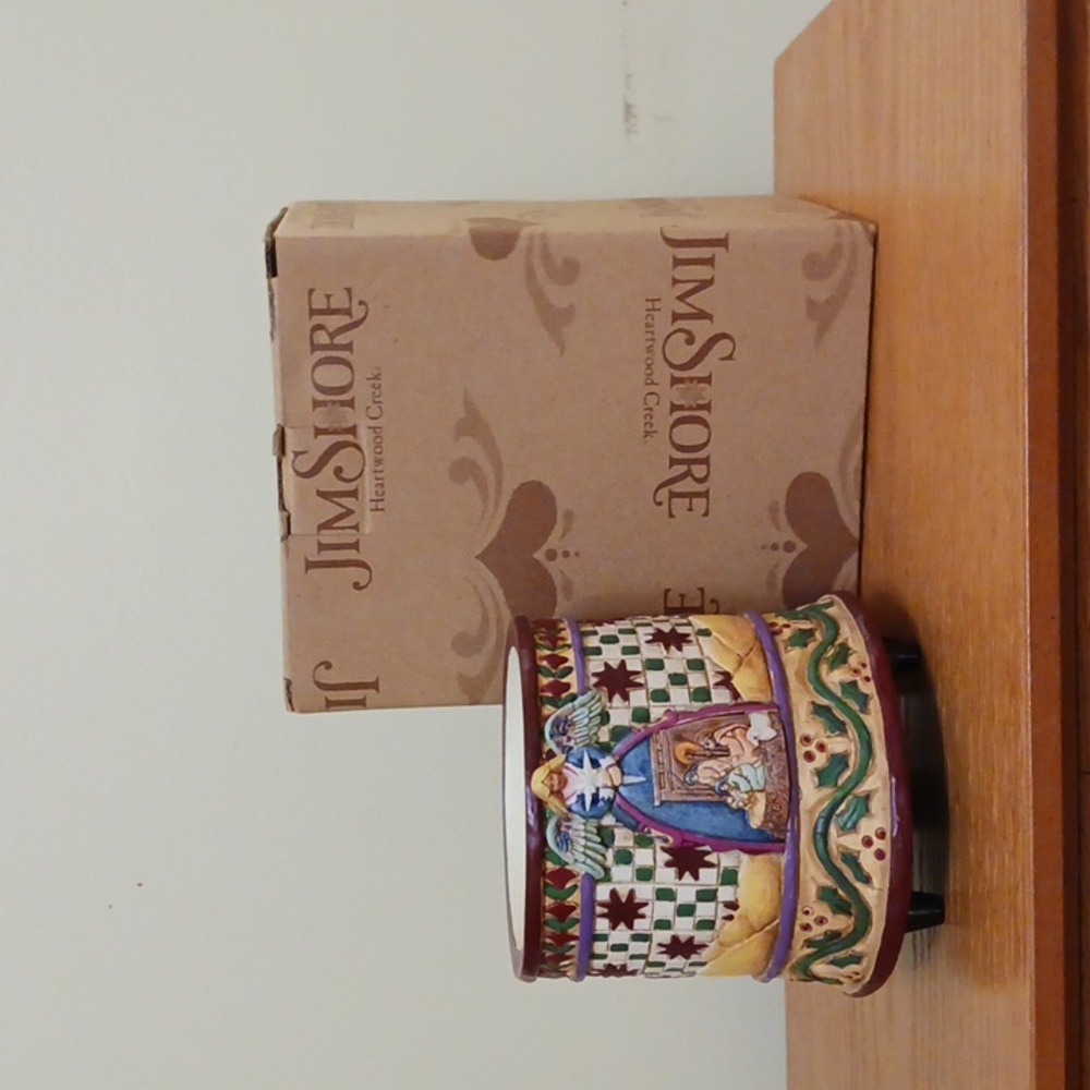 Jim Shore Votive candle warmer.